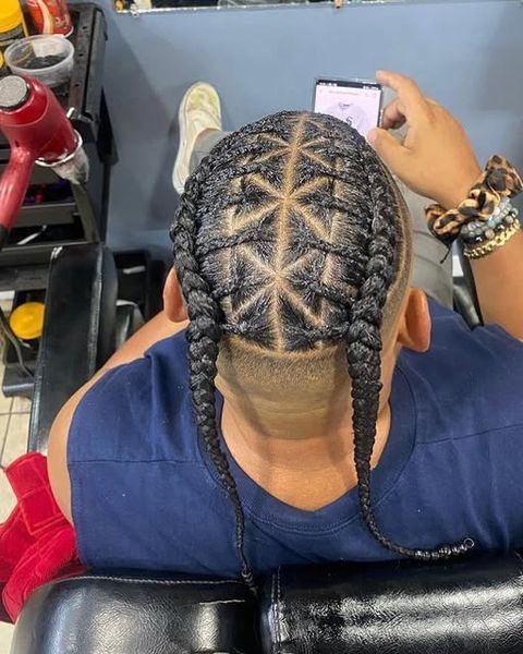 Diseño con trenzas en El Pequeño Barbershop, Reading PA